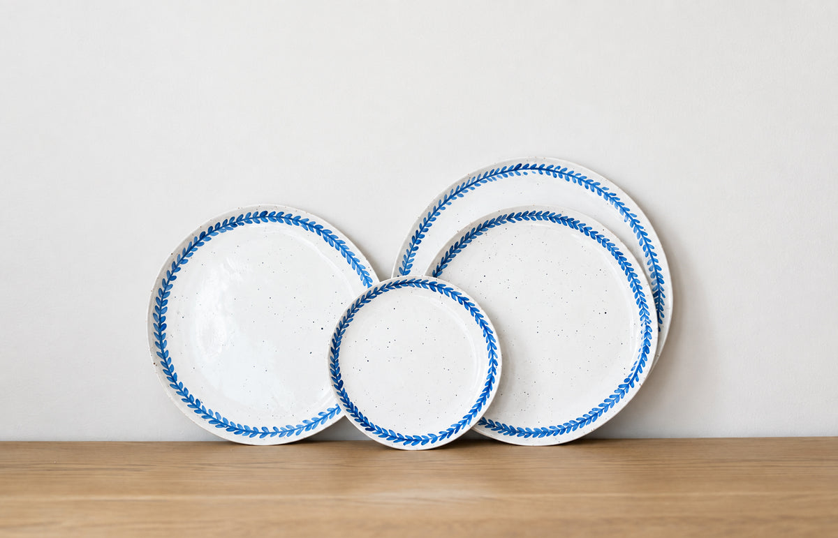 Handmade stoneware salad plate crafted in Berkshire from smooth speckled clay and finished with a hand-painted cobalt blue rim. Timeless, versatile ceramics for everyday use.