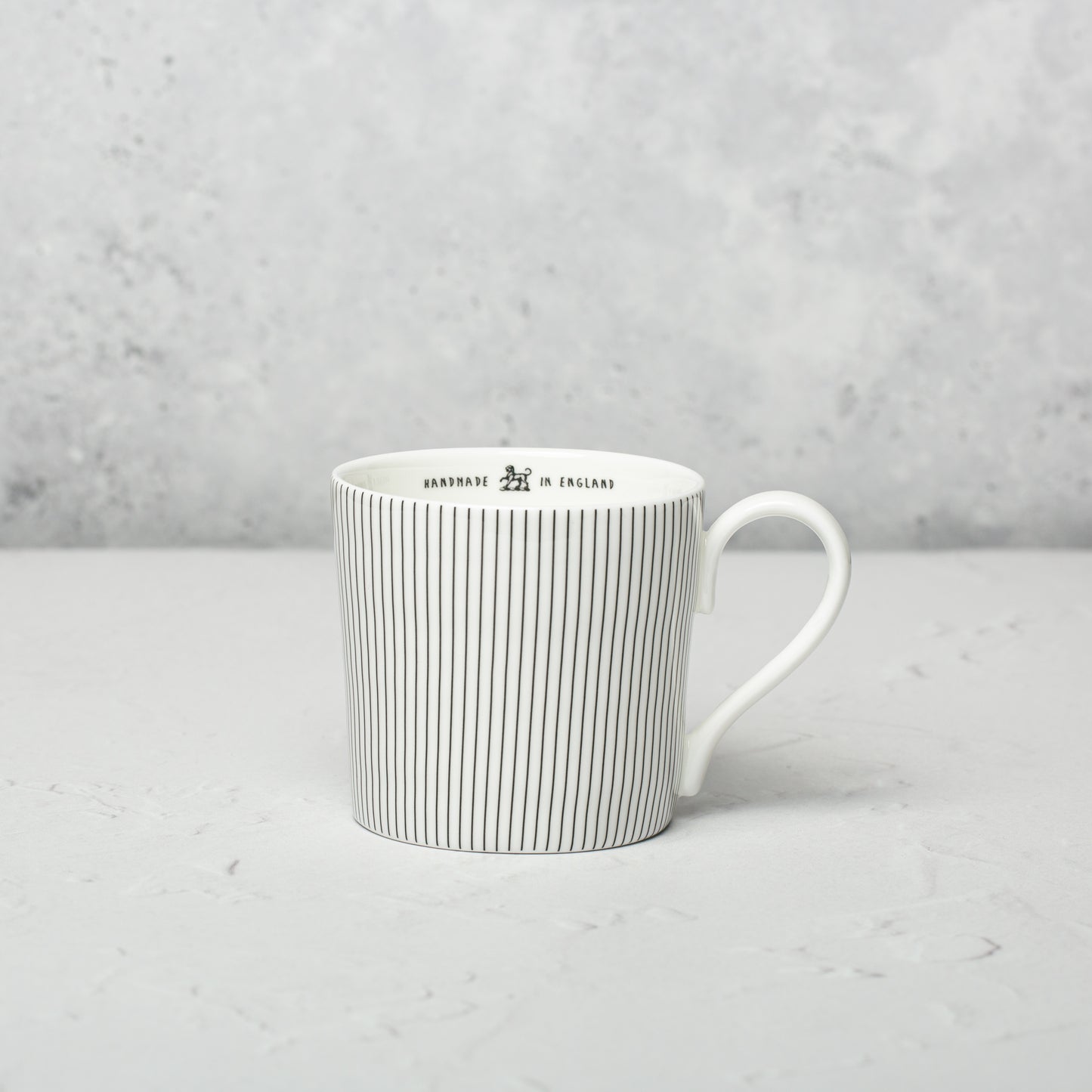 Bone china mug by Emma Alington.