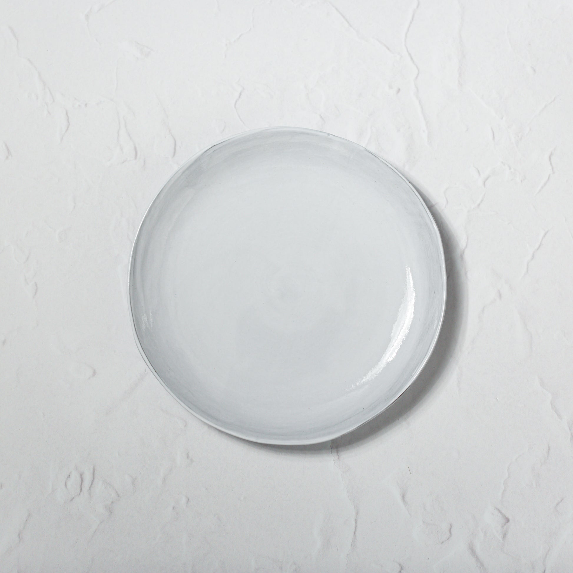 Emma Alington black stoneware bowls and plates.