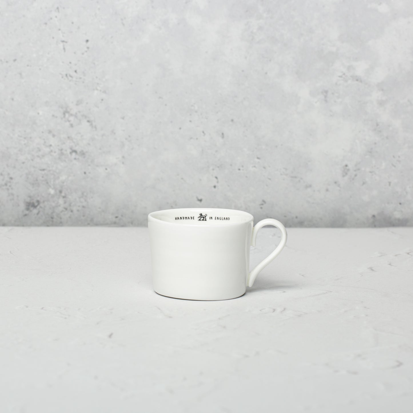 Bone china espresso cup by Emma Alington.