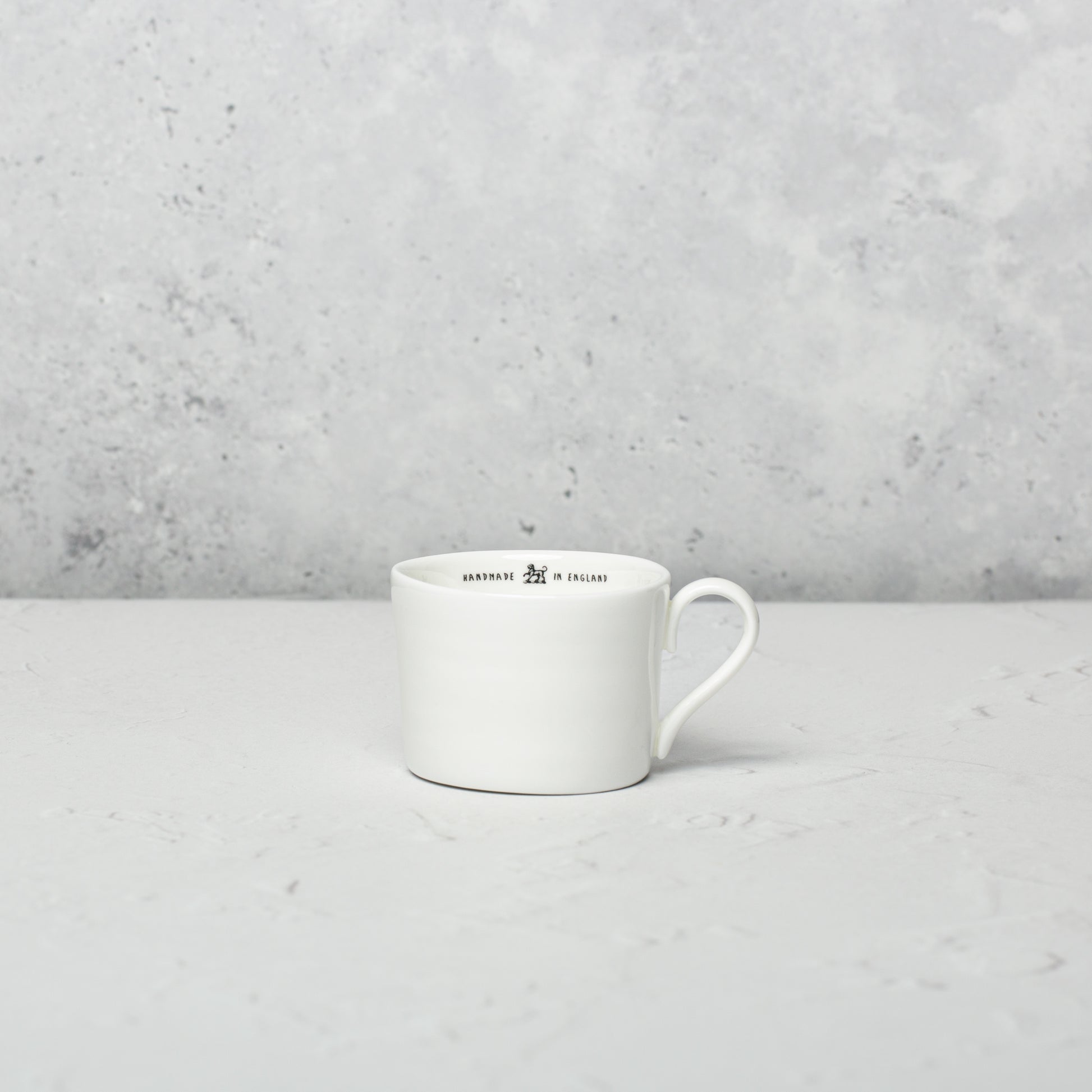 Bone china espresso cup by Emma Alington.
