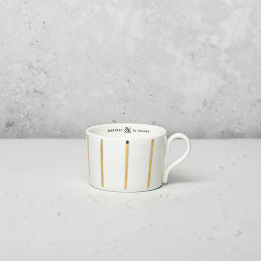 Bone china medium cup by Emma Alington.