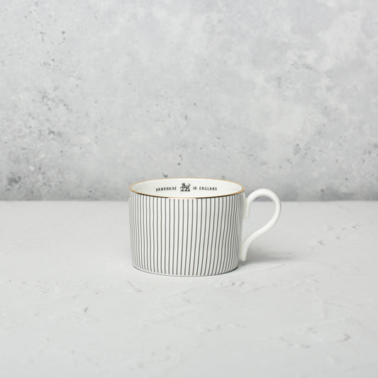 Bone china medium cup by Emma Alington.