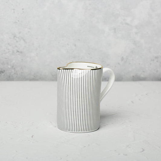 Bone china milk jug by Emma Alington.