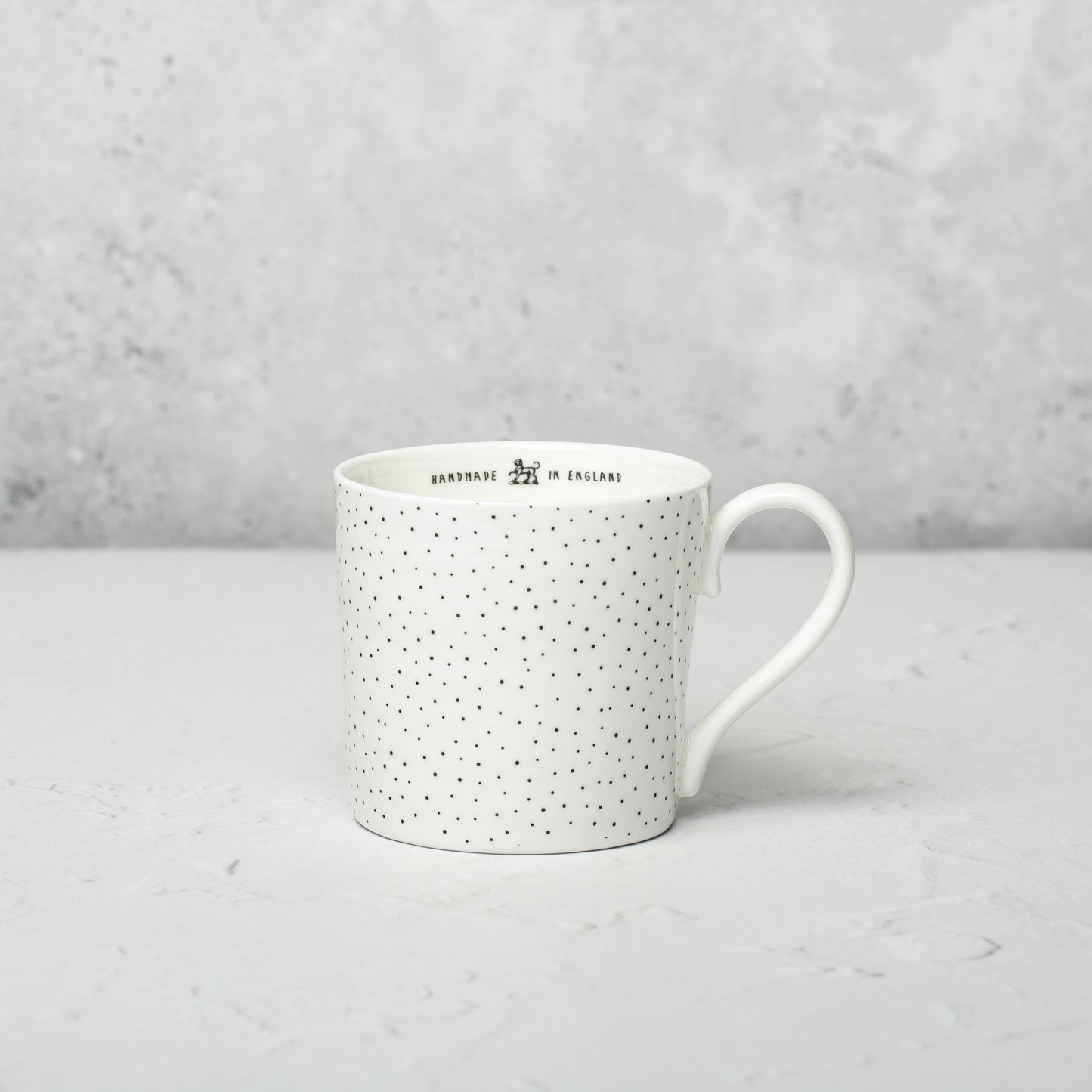 Bone china mug by Emma Alington.