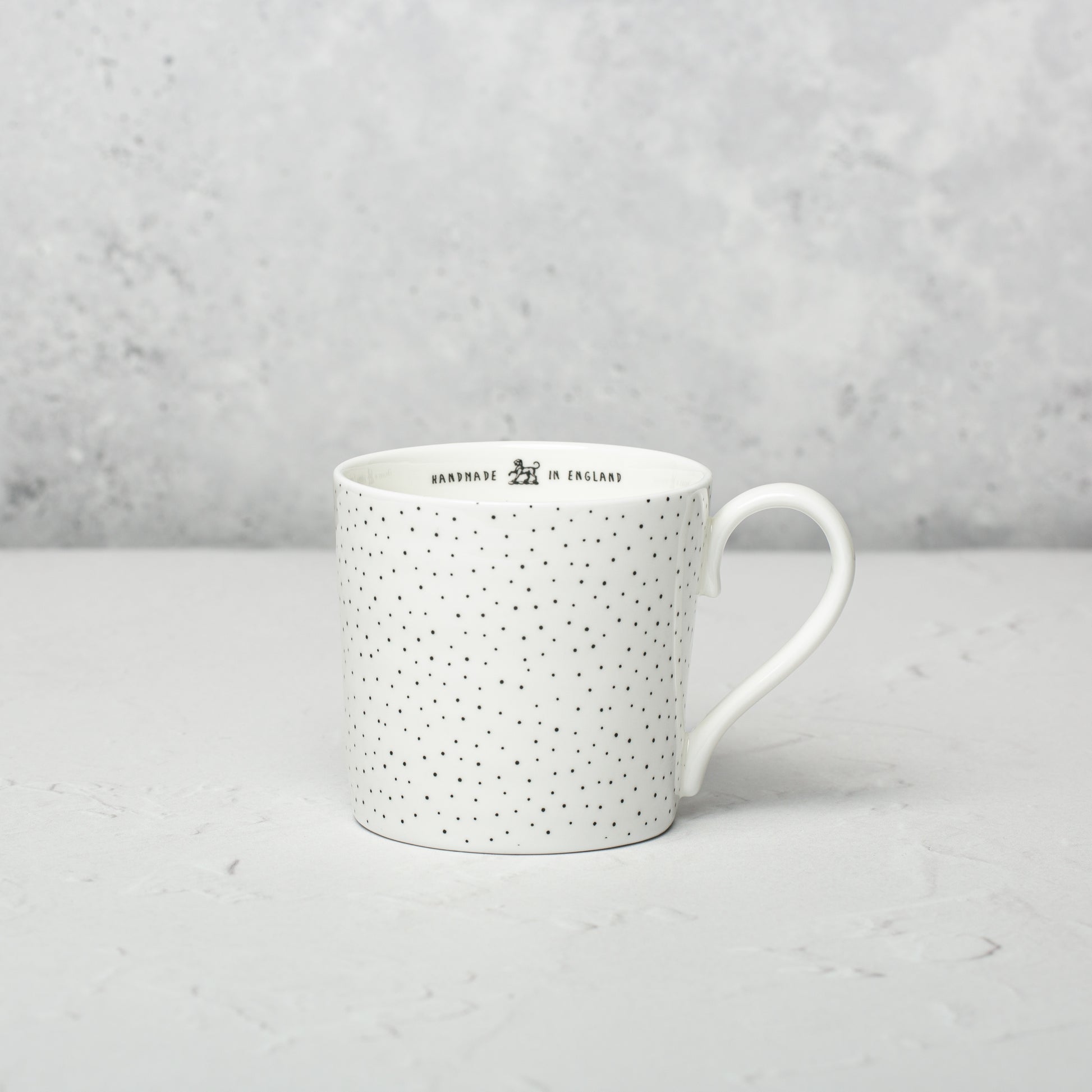Bone china mug by Emma Alington.