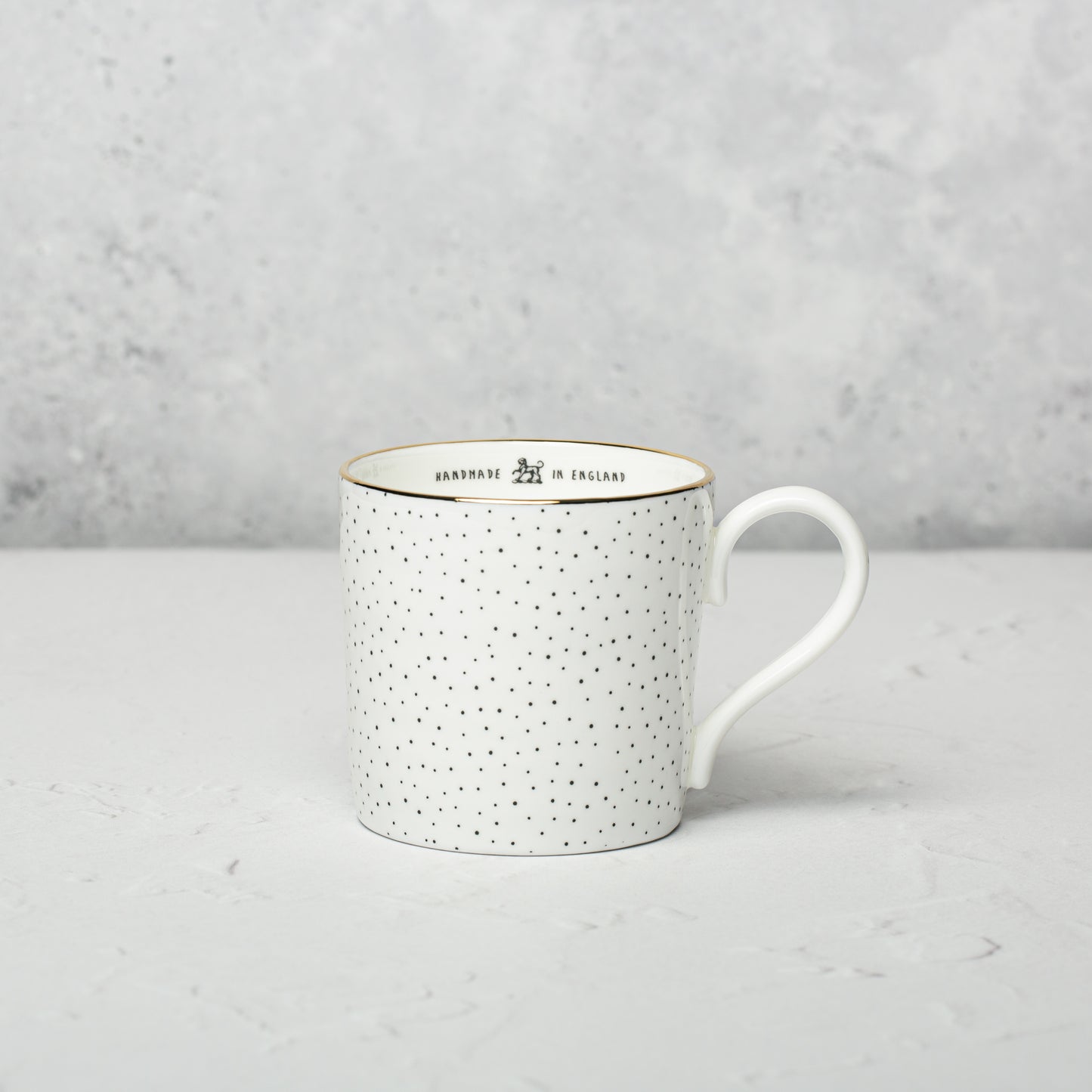 Bone china mug by Emma Alington.