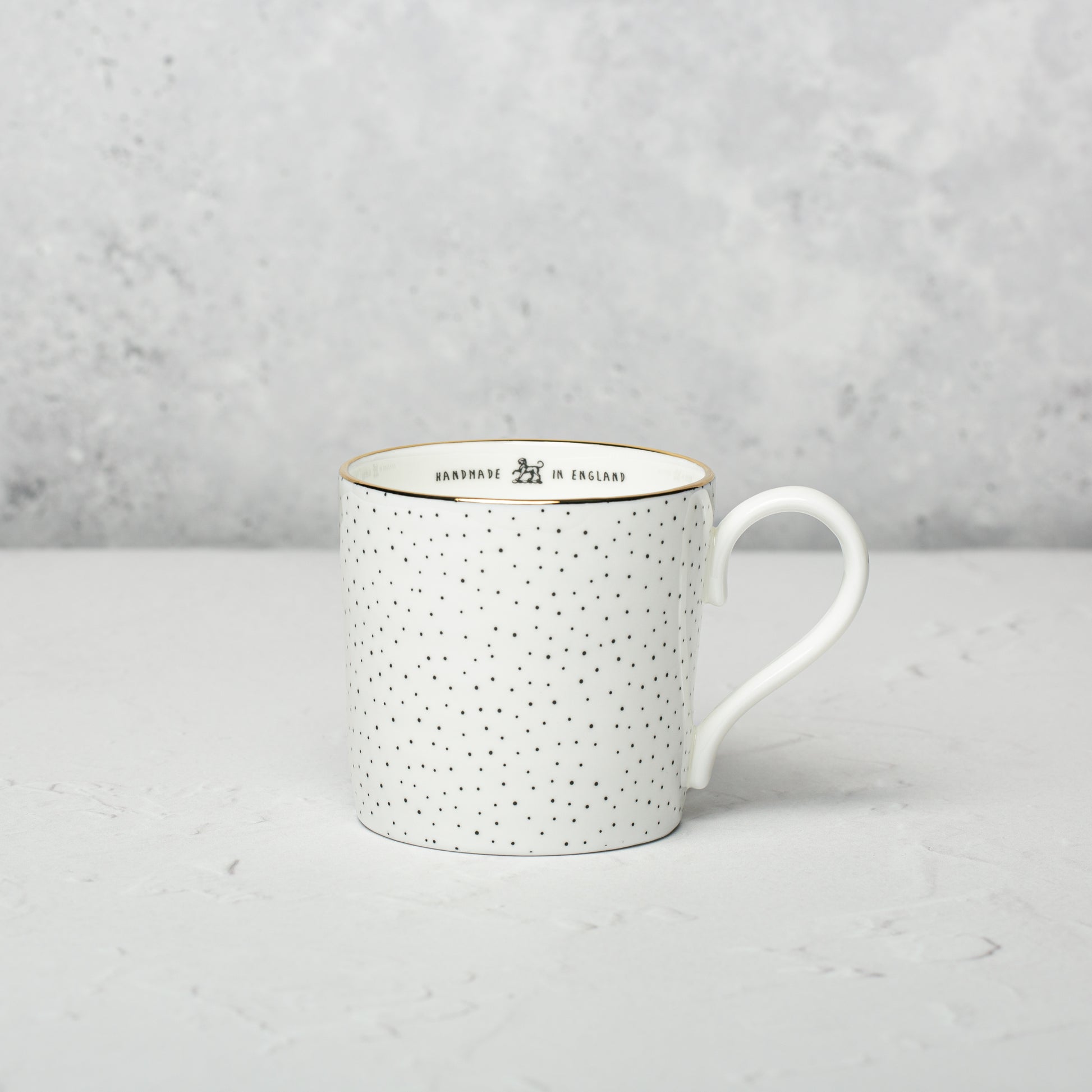 Bone china mug by Emma Alington.