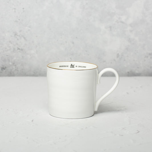 Bone china mug by Emma Alington.