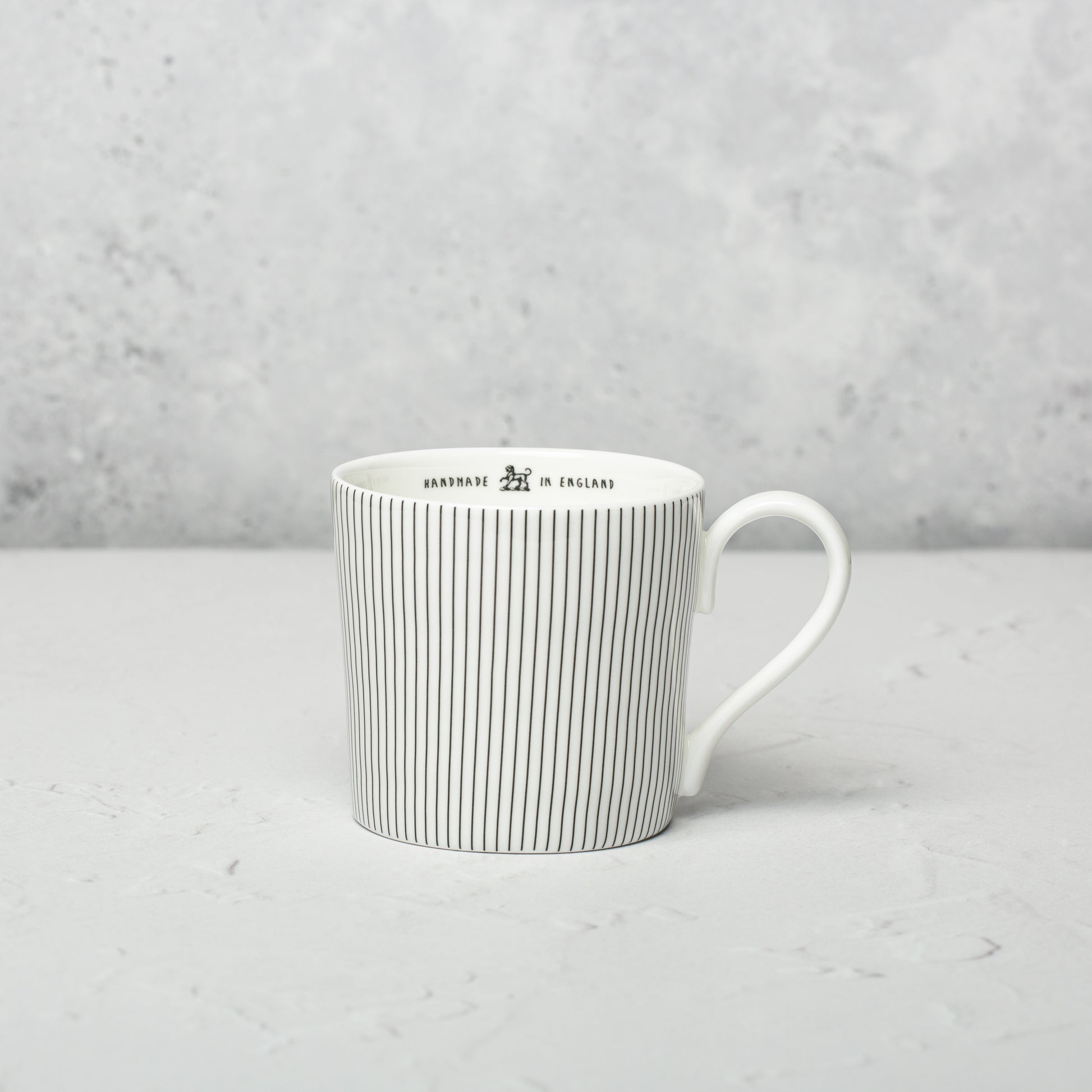 Bone china mug by Emma Alington.