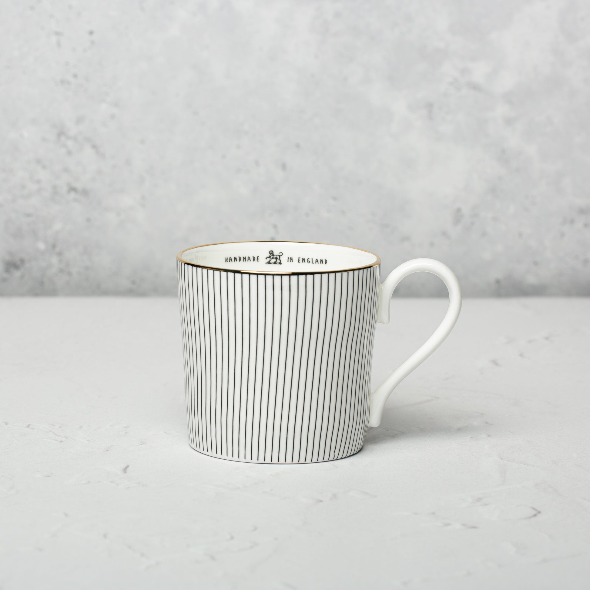 Bone china mug by Emma Alington.