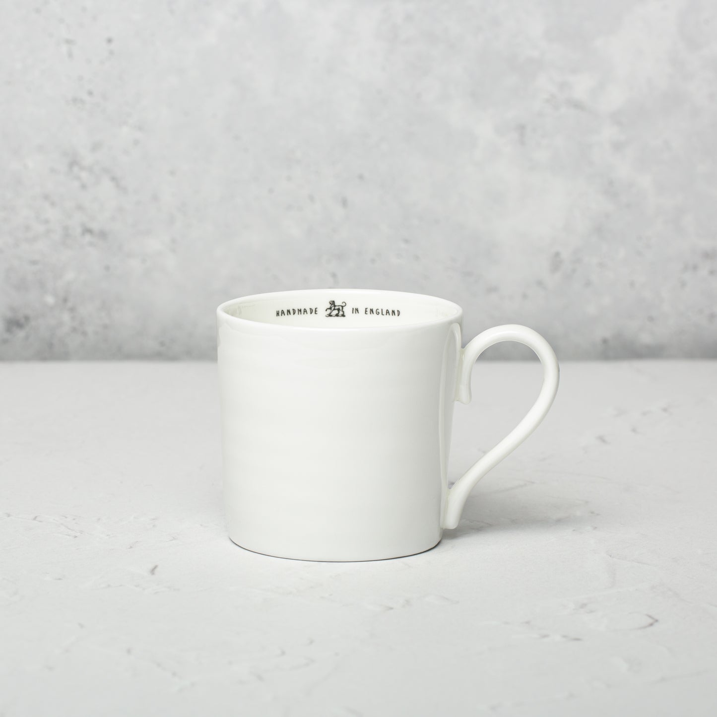 Bone china mug by Emma Alington.