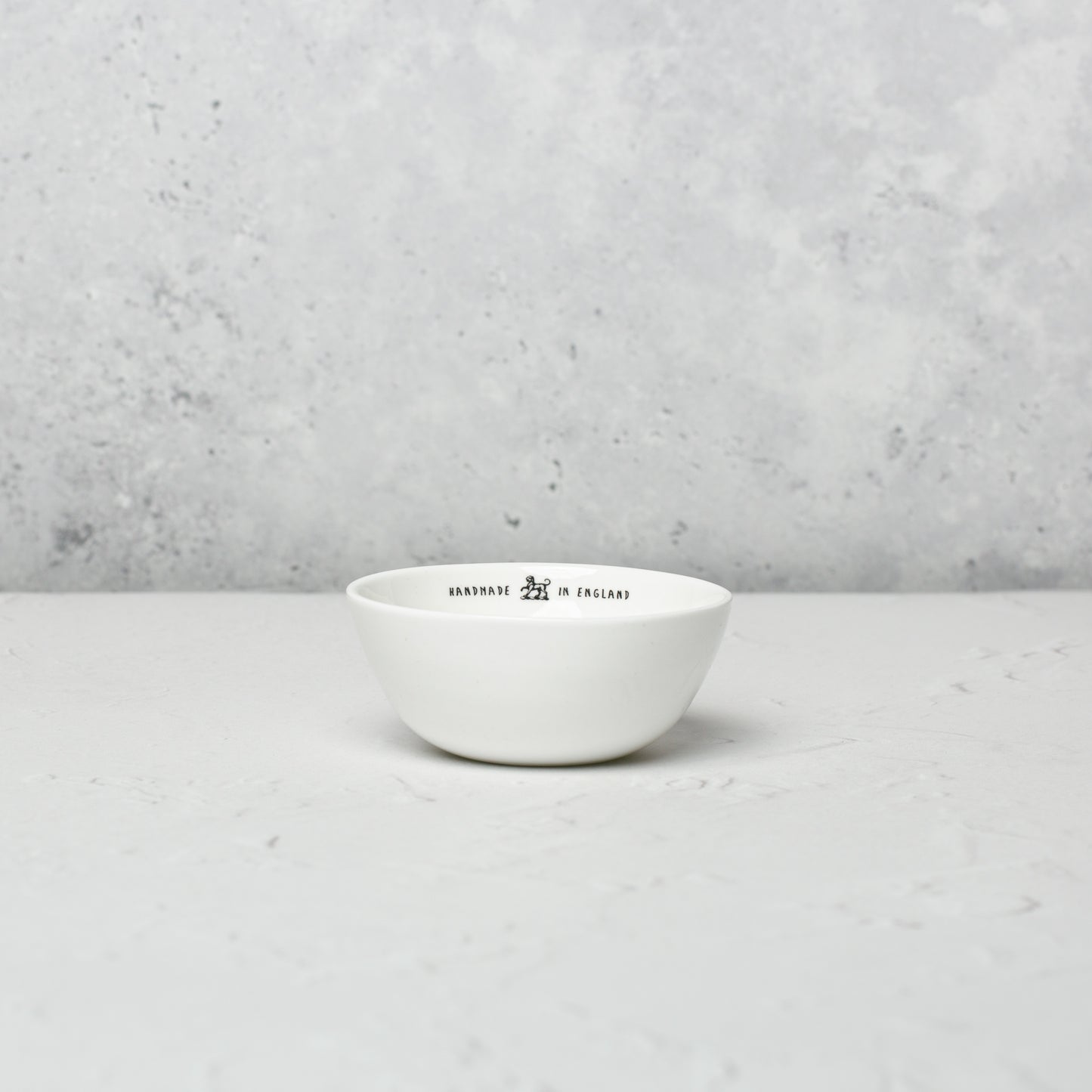 Small bone china bowls by Emma Alington.