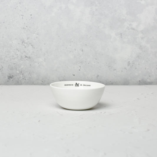 Small bone china bowls by Emma Alington.